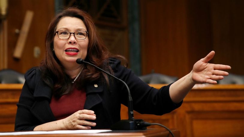 In this Feb. 14, 2018, file photo, Sen. Tammy Duckworth, D-Ill., speaks on Capitol Hill, in Washington. Duckworth has given birth to a baby girl, making her the first U.S. senator to give birth while in office. The Illinois Democrat announced she delivered her second daughter, Maile Pearl Bowlsbey, on Monday, April 9, 2018.