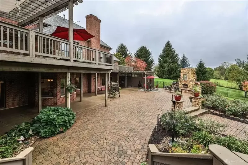 Spacious social areas blend with outdoor living space for this two-story home sitting on 2.53 acres along a creek and canopy of trees. Listed for $775,000, this brick two-story on Montgomery County Line Road has about 5,550 square feet of living space. PHOTOS COURTESY OF DAYTON REALTORS