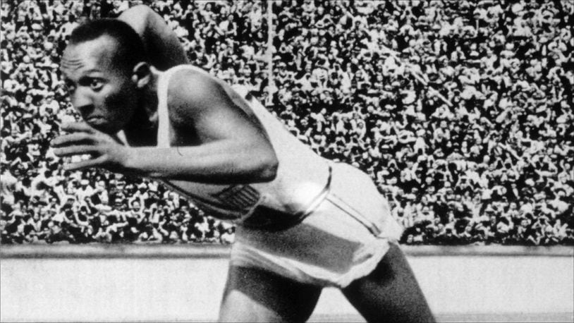 BERLIN - 1936 :  Jesse Owens of the USA in action in the mens 200m at the 1936 Summer Olympic Games held in Berlin, Germany.  Owens won a total of four gold medals in the Olympics, winning the mens 100m final, 200m final and the long jump competiton as well as being part of the victorious USA 4x100m relay team. (Photo by Getty Images/Getty Images)