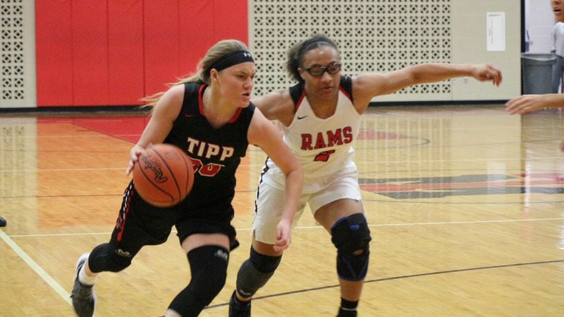 Allison Mader (left), driving against Trotwood-Madison’s Myla Barnes (2). Tippecanoe won a GWOC North title for the third consecutive season. Contributed / Greg Billing