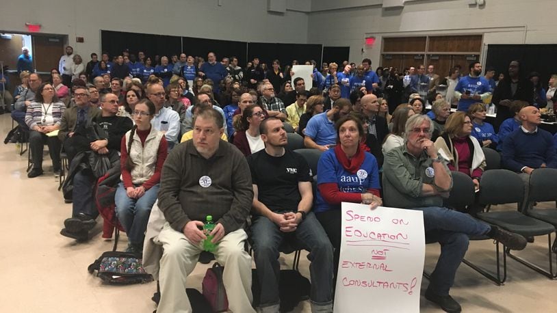 FILE: Members of the Wright State University faculty union protest at a forum on campus in 2018.
