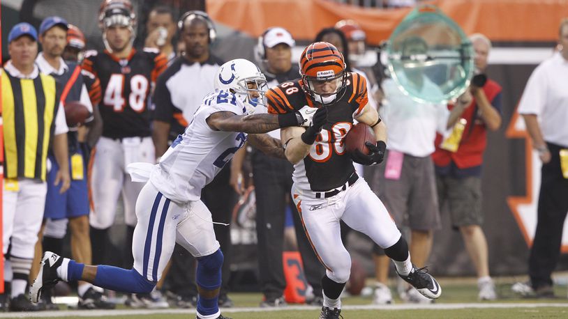 CINCINNATI, OH - SEPTEMBER 1: Ryan Whalen #88 of the Cincinnati Bengals makes a move after a reception against Kevin Thomas #21 of the Indianapolis Colts during an NFL preseason game at Paul Brown Stadium on September 1, 2011 in Cincinnati, Ohio. The Colts won 17-13. (Photo by Joe Robbins/Getty Images)