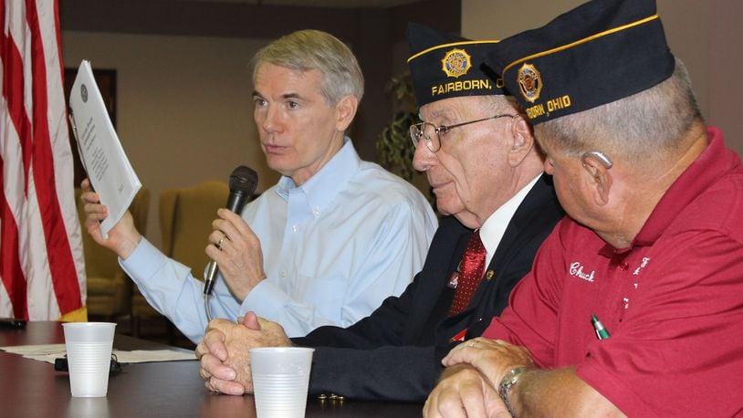 U.S. Sen. Rob Portman, R-Ohio, at a roundtable discussion with Dayton-area veterans to discuss the backlog of benefit claims and other problems with the Veterans health Administration in Fairborn in May 2014. FILE