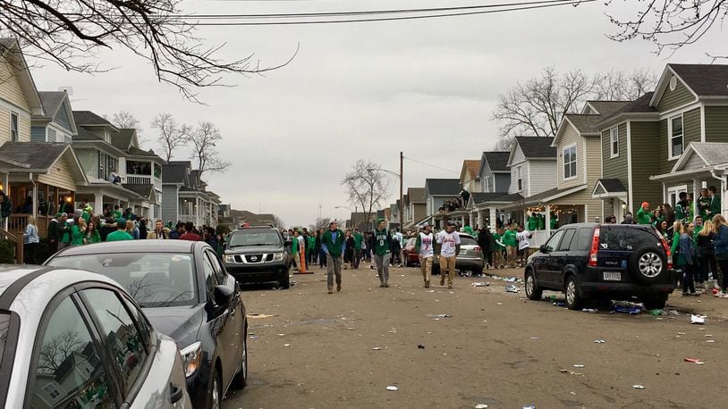 University of Dayton gathered in the streets Saturday afternoon celebrating St. Patrick’s Day in the area of Kiefaber and Evanston. Police moved in late in the afternoon and ordered students to disperse. There were no immediate reports of injuries. MARK GOKAVI/STAFF