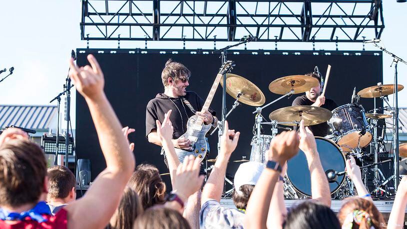 Bryan Scott, lead vocalist and guitarist of the band Sick Puppies, plays during a concert at Summer Fest on July 29 at Wright-Patterson Air Force Base. U.S. AIR FORCE PHOTO/JAIMA FOGG