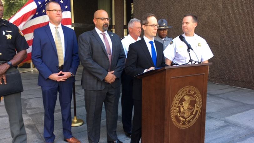 Federal prosecutors and investigators announce 19 indictments against alleged drug ring participants in a Sept. 26 news conference at Dayton’s U.S. District Court. THOMAS GNAU/STAFF