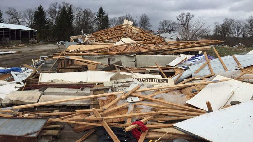 Greene County farmer Randy Rife said his farm at 2423 Clifton Road lost a porch, grain bins, barns, three ewes, two lambs, and “we don’t know what else” in Tuesday’s tornado. CHUCK HAMLIN / STAFF