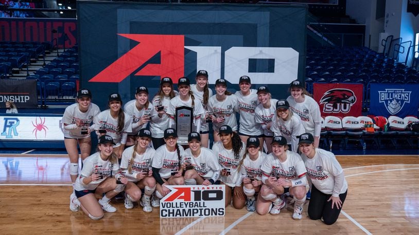 Dayton celebrates after winning the Atlantic 10 Conference volleyball tournament championship on Sunday, Nov. 21, 2021, at the UMPC Cooper Fieldhouse in Pittsburgh, Pa. Photo courtesy of Dayton Athletics