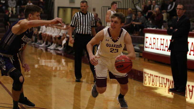 Earlham College’s Austin Doliboa (23) makes a move toward the basket during a 95-81 loss to visiting Kenyon on Nov. 15, 2017, in Richmond, Ind. PHOTO COURTESY OF EARLHAM ATHLETICS
