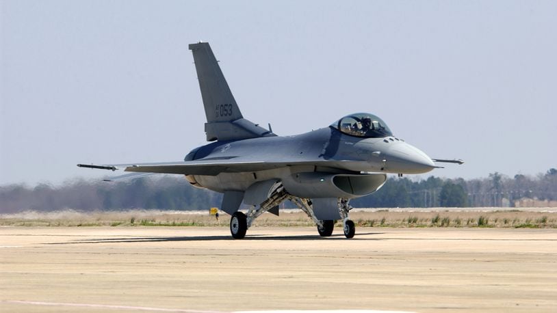 Brig. Gen. Jeff Riemer delivers the last new Air Force F-16 Fighting Falcon here March 18 at Shaw Air Force Base in March 2005. While Lockheed continued to produce F-16s for international coalition partners, this aircraft was the last of 2,231 F-16s produced for the Air Force. (U.S. Air Force photo by Staff Sgt. Josef E. Cole III)