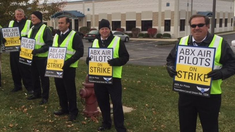 About 250 pilots who fly for the cargo carrier ABX Air, which operates flights for Amazon and DHL, went on strike in November 2016 in Wilmington. A judge ordered them back to work. CHUCK HAMLIN / STAFF