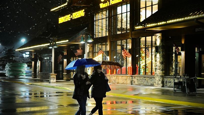 Black Friday shoppers deal with rainy chilly weather to get good deals at Cabela’s in Centerville Friday morning on Nov. 25, 2022. MARSHALL GORBY \STAFF