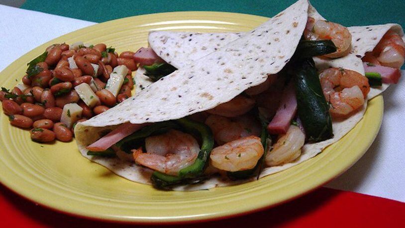 Shrimp and Poblano Pepper Tacos with Pinto Bean Salad (Linda Gassenheimer/TNS)