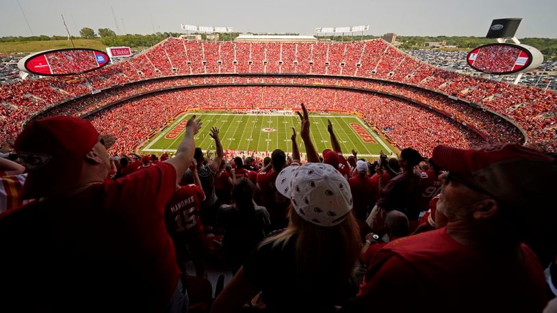 Fans do the tomahawk chop as the Kansas City Chiefs and the Cleveland Browns play during the first half of an NFL football game at Arrowhead Stadium, Sunday, Sept. 12, 2021, in Kansas City, Mo. (AP Photo/Charlie Riedel)