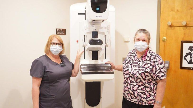 Amy Dardinger (left), a Wright-Patterson Medical Center mammography technician, and Aimee Barnes, mammography supervisor, stand ready to begin mammograms during Women’s Wellness Day on Oct. 7. They assisted over 40 women with screenings. U.S. AIR FORCE PHOTO/KENNETH STILES