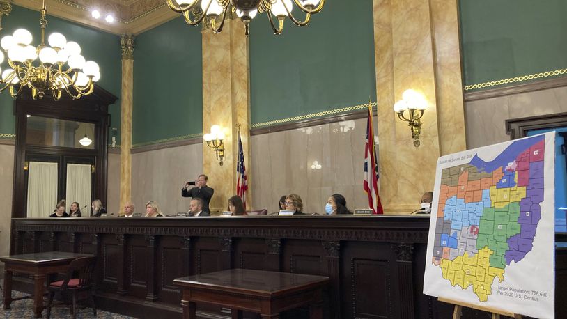 Members of the Ohio Senate Government Oversight Committee hear testimony on a new map of state congressional districts on Tuesday, Nov. 16, 2021, at the Ohio Statehouse in Columbus, Ohio. (AP Photo/Julie Carr Smyth)