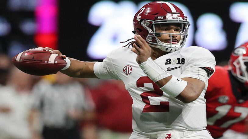 Alabama quarterback Jalen Hurts passes against Georgia during the College Football Playoff National Championship at Mercedes-Benz Stadium in Atlanta on January 8, 2018. (Curtis Compton/Atlanta Journal-Constitution/TNS)