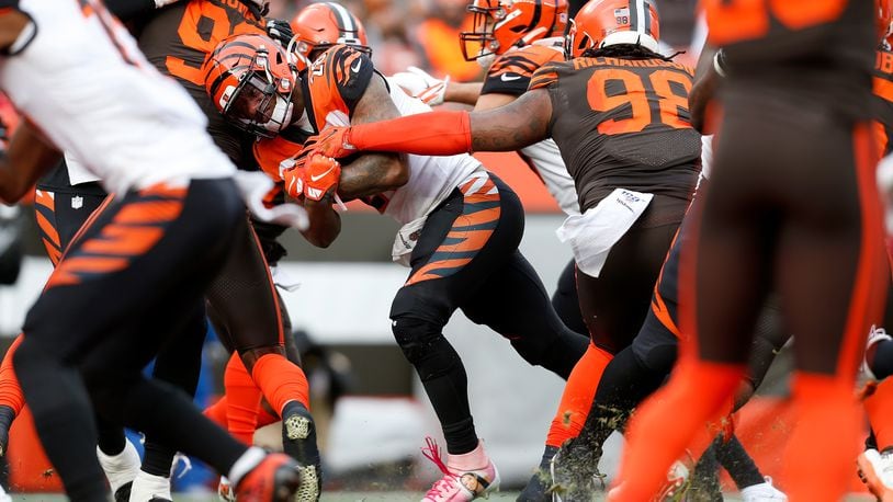 CLEVELAND, OH - DECEMBER 8: Joe Mixon #28 of the Cincinnati Bengals scores a touchdown during the second quarter of the game against the Cleveland Browns at FirstEnergy Stadium on December 8, 2019 in Cleveland, Ohio. (Photo by Kirk Irwin/Getty Images)