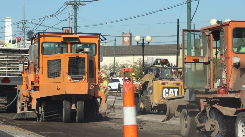 Construction crews work to resurface Wayne Avenue in the Oregon Historic District. CORNELIUS FROLIK / STAFF