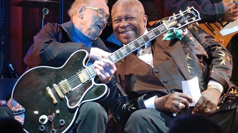 Music legends Les Paul, then 88, left, and B.B. King, then 77, at a jam session at the third anniversary celebration of the B.B. King Blues Club and Grill in New York’s Times Square, in 2003. AP Photo/Richard Drew