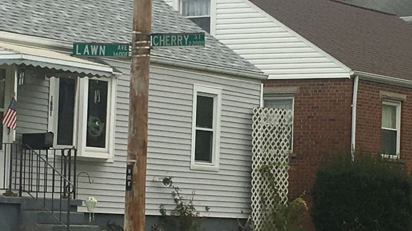 A man and his dog were injured during an incident with another dog today at the corner of Lawn Avenue and Cherry Street, according to Middletown officials. RICK McCRABB/STAFF
