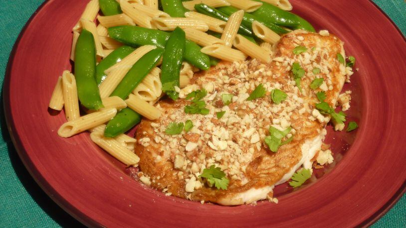Sole Almondine (Almond-Crusted Sole) with Penne and Sugar Snap Peas only takes minutes to make. Linda Gassenheimer/TNS