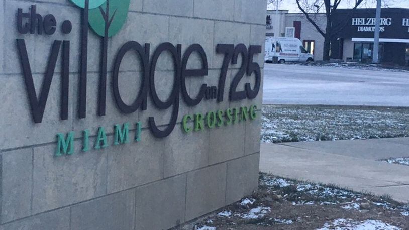 The Villages at 725 on Miamisburg-Centerville Road in Miami Twp. have adopted the Miami Crossing District brand into its signage. NICK BLIZZARD/STAFF PHOTO