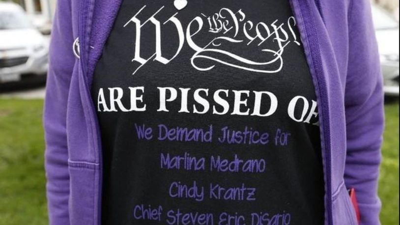 This T-shirt was worn at a rally in Newark in May to protest the fatal shootings of three people in Kirkersville by the ex-boyfriend of one of the victims. BARBARA J. PERENIC/THE COLUMBUS DISPATCH