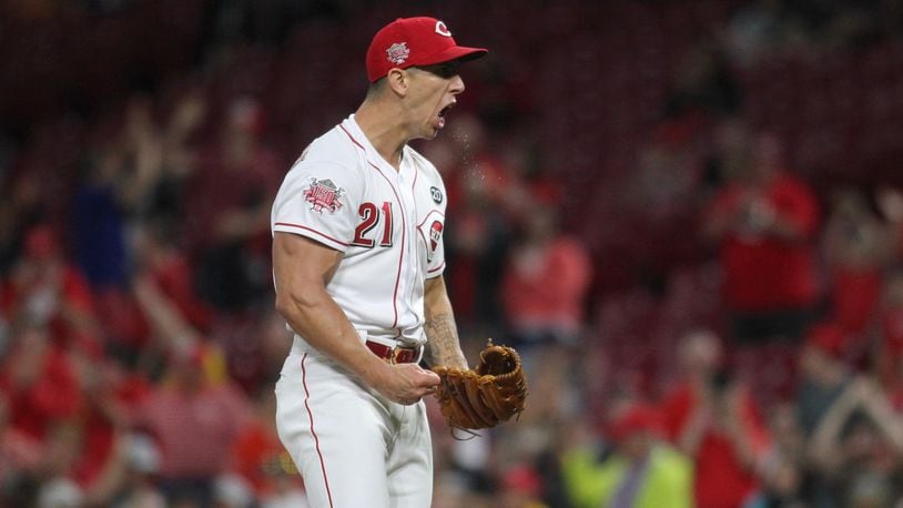 Reds reliever Michael Lorenzen reacts after the final out of a victory against the Astros on Monday, June 17, 2019, at Great American Ball Park in Cincinnati. David Jablonski/Staff