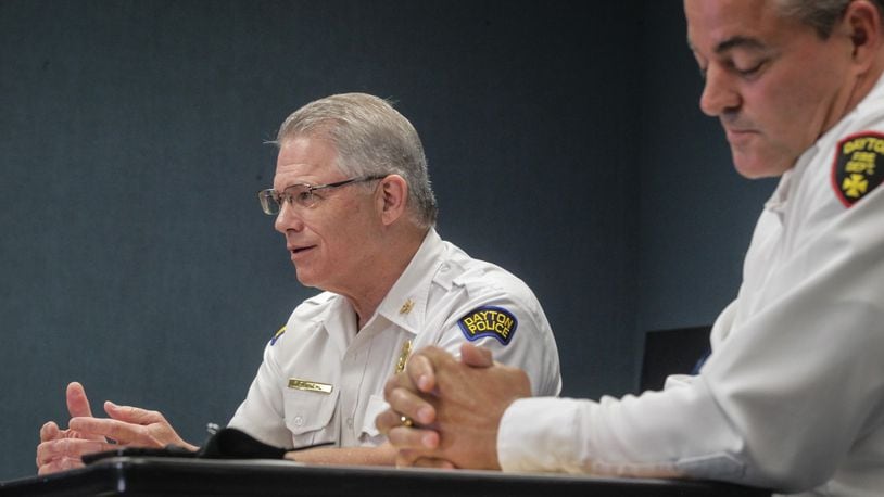 Reflecting on the one-year anniversary of the Oregon District shooting, Dayton Police Chief Richard Biehl, left and City of Dayton Fire Chief Jeff Lykins. JIM NOELKER/STAFF