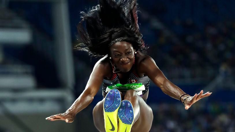 Canada's Christabel Nettey makes an attempt in the women's long jump qualification during the athletics competitions of the 2016 Summer Olympics at the Olympic stadium in Rio de Janeiro, Brazil, Tuesday, Aug. 16, 2016. (AP Photo/Matt Slocum)
