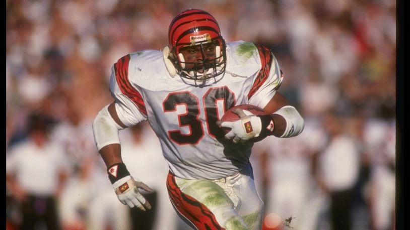 Bengals running back Ickey Woods runs with the ball during a playoff game against the Raiders at the Coliseum in Los Angeles, California. The Raiders won, 20-10.
