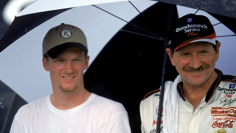 DARLINGTON, SC - SEPTEMBER 3:  Dale Earnhardt Jr. and Dale Earnhardt Sr. pose for a photograph after the Pepsi Southern 500 at the Darlington Raceway on September 3, 2000 in Darlington, South Carolina.  (Photo by Craig Jones/Getty Images)