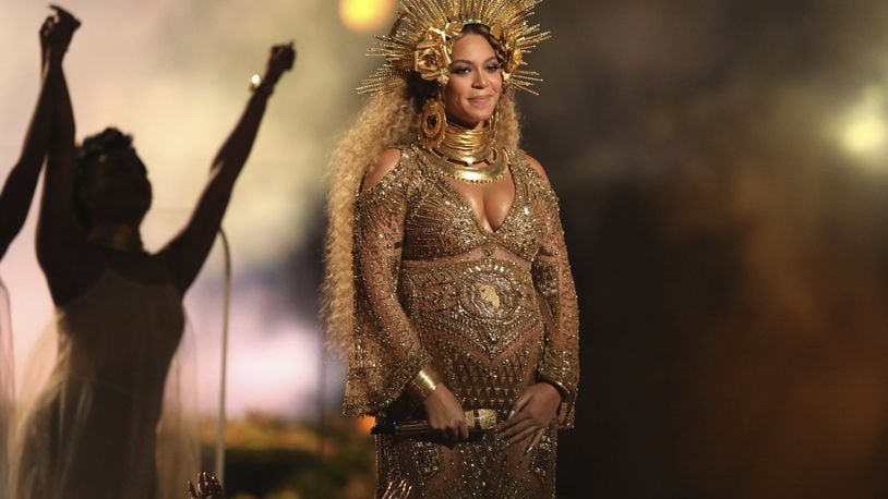This Feb. 12, 2017 file photo shows Beyonce performing at the 59th annual Grammy Awards in Los Angeles. Beyonce is pregnant with twins. (Photo by Matt Sayles/Invision/AP, File)