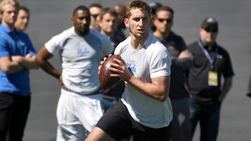 UCLA quarterback Josh Rosen rolls out during UCLA's pro day for NFL draft prospects in Los Angeles, Thursday, March 15, 2018. (AP Photo/Michael Owen Baker)