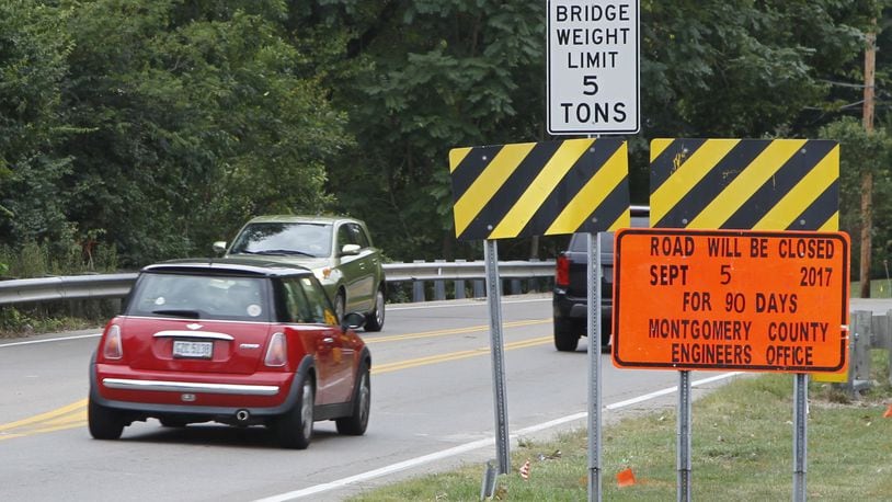 Work on a bridge over Holes Creek in Washington Twp. is prompting detours on Alex-Bell Road through the end of November. CHRIS STEWART / STAFF