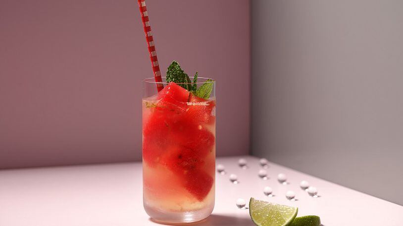 The beauty of watermelon cubes is that they chill your drink without diluting it. Here they give color to a refreshing homemade limeade. (Food styling by Joan Moravek.) (E. Jason Wambsgans/Chicago Tribune/TNS)