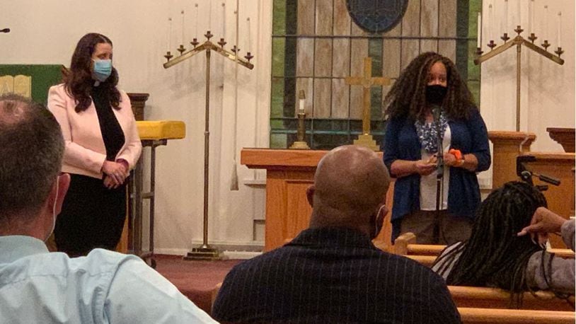 The Rev. Tracy Paschke-Johannes, left, and Angela Brown field questions Tuesday, March 16, 2021 during a meeting of the Parents Empowering All Children of Color at the Springboro United Church of Christ. Nearly 50 people, including Springboro school board members and district administrators. attended the meeting to hear first-hand incidents of racism from students who experienced it in grade school to high school. The group was formed last June to provide mutual support for parents of children of color and is working to make change in the district. ED RICHTER/STAFF