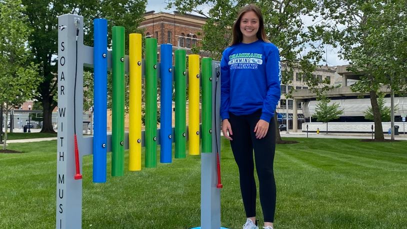 Grace Schaefer, a recent graduate of Chaminade Julienne, co-created “Soar with Music Chimes," a musical instrument project ,with another CJ student, Sam Downing. Eileen McClory / Staff