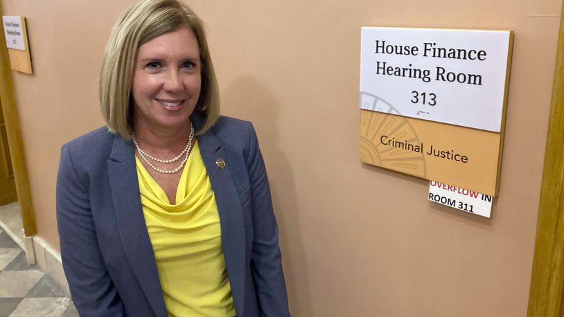 State Rep. Cindy Abrams, a Cincinnati Republican and former police officer, stands outside the Statehouse hearing room where her bill increasing punishments against violent protesters was approved on Wednesday, Nov. 10, 2021, in Columbus, Ohio. Abrams called the measure, approved by the GOP-controlled House Criminal Justice Committee along party lines, common sense legislation that supports people's right to peacefully assemble while punishing lawbreakers. (AP Photo/Andrew Welsh-Huggins)