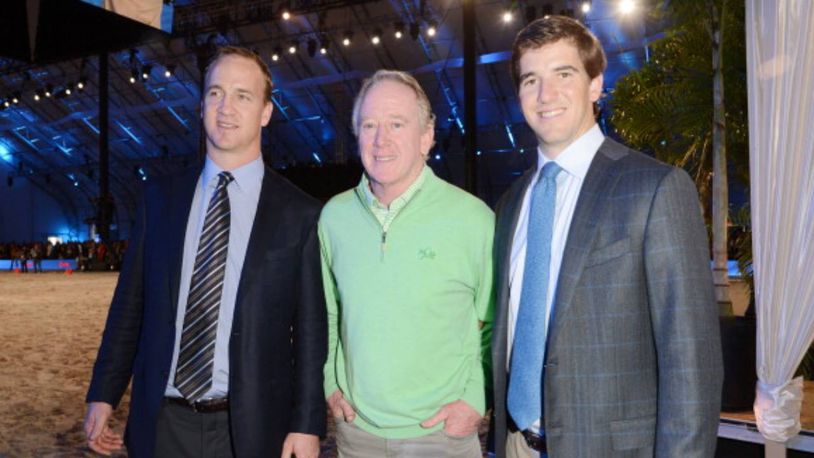 Archie Manning, center, never played in a Super Bowl, but his sons Peyton, left, and Eli won two apiece.