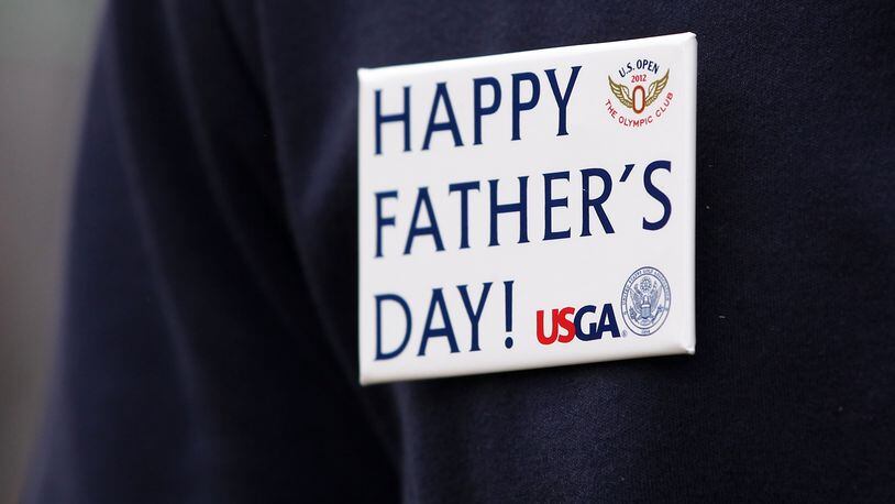 SAN FRANCISCO, CA - JUNE 17: A fan wears a badge that reads 'Happy Father's Day' during the final round of the 112th U.S. Open at The Olympic Club on June 17, 2012 in San Francisco, California. (Photo by Andrew Redington/Getty Images)
