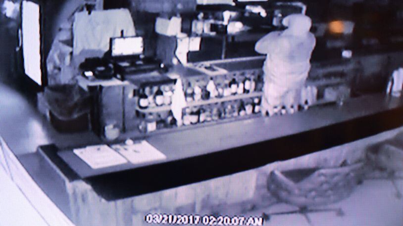 Surveillance photos of the March 20 burglary of the Eagles Lodge in Franklin. CONTRIBUTED