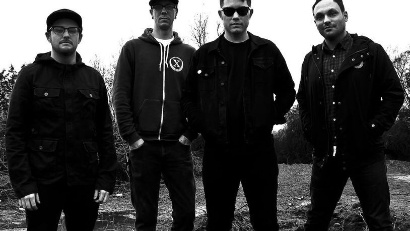 Hawthorne Heights — (left to right) Matt Ridenour, Chris Popadak, JT Woodruff and Mark McMillon — will present its first Dayton Is for Lovers Festival at the Yellow Cab Bldg. on Friday, Nov. 20. CONTRIBUTED