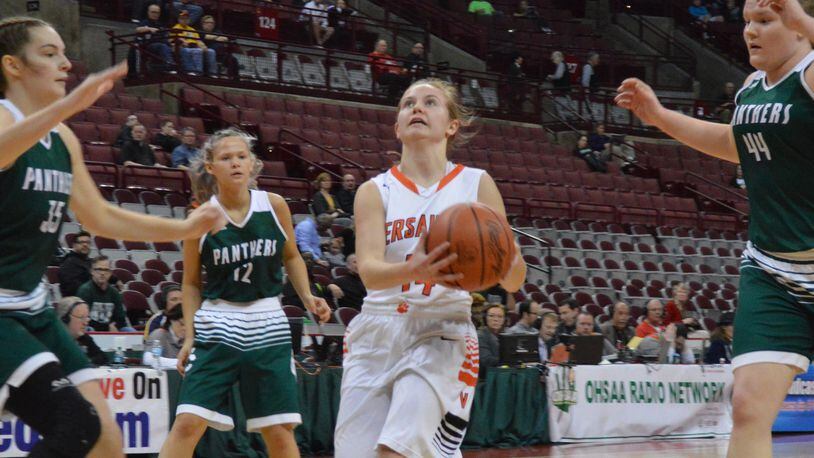 Caitlin McEldowney of Versailles (with ball). Versailles defeated Elyria Catholic 63-47 in a girls high school basketball D-III state semifinal at OSU’s Schottenstein Center on Thursday, March 15, 2018. ERIC FRANTZ / CONTRIBUTOR