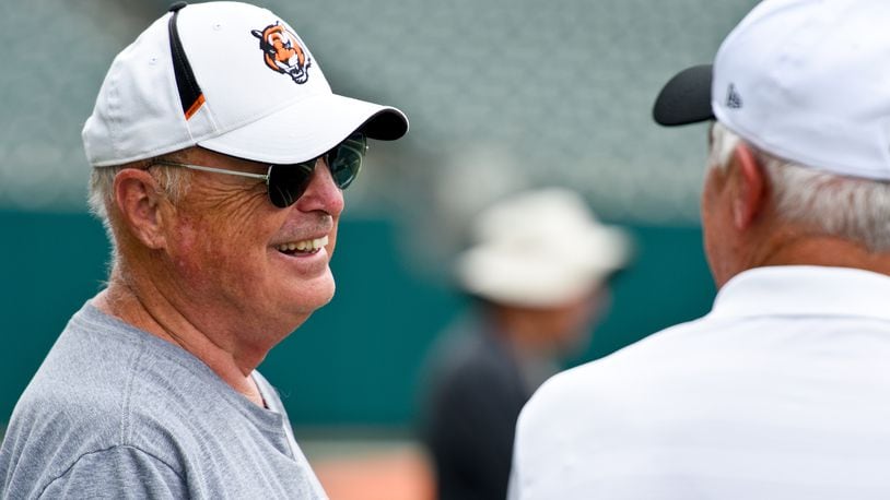 Bengals owner Mike Brown, left, talks to former Bengals quarterback Ken Anderson during Bengals minicamp Wednesday, June 17 at Paul Brown Stadium in Cincinnati. NICK GRAHAM/STAFF