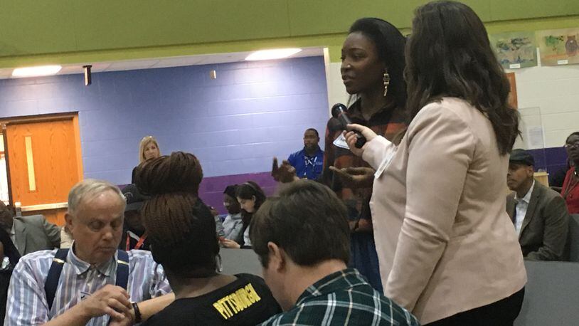 Parents and residents asked questions about Dayton Public Schools’ turnaround plan at a recent town hall meeting.