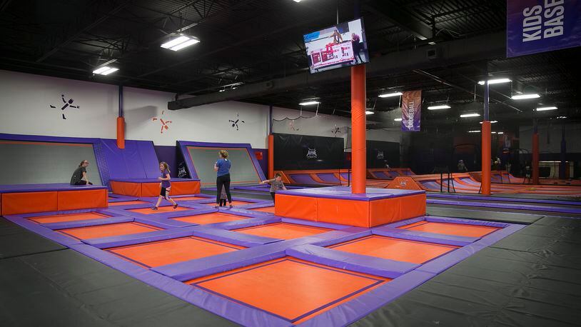 A jumping area at Altitude Trampoline Park, which plans to open a new location in Warren County’s Deerfield Twp. in early 2018. STAFF FILE PHOTO