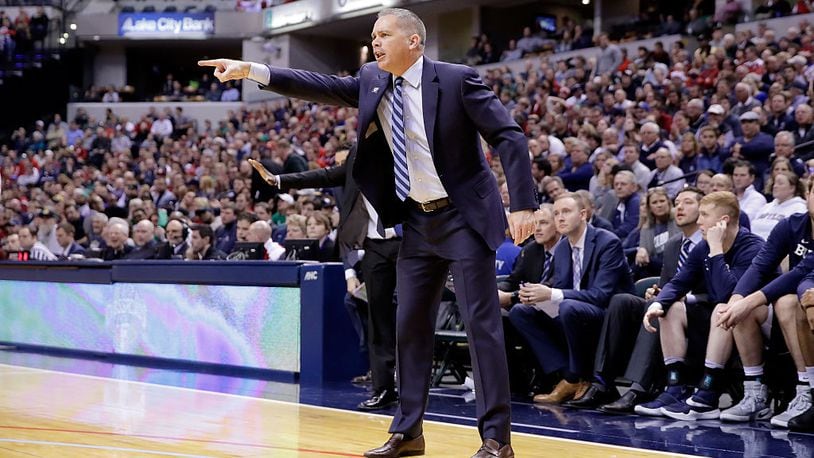 INDIANAPOLIS, IN - DECEMBER 17:  Chris Holtmann the head coach of the Butler Bulldogs gives instructions to his team during the 83-78 win over the Indiana Hoosiers during the Crossroads Classic at Bankers Life Fieldhouse on December 17, 2016 in Indianapolis, Indiana.  (Photo by Andy Lyons/Getty Images)