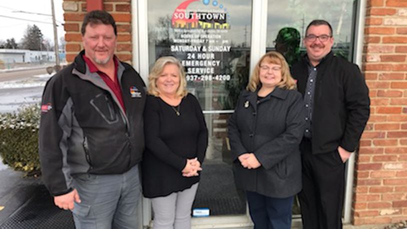 The owners of Southtown sold their company to Seiter Services, a Xenia HVAC company. (From left to right: Joe and Terri Trame of Southtown, Shelia and Chris Seiter of Seiter Services)